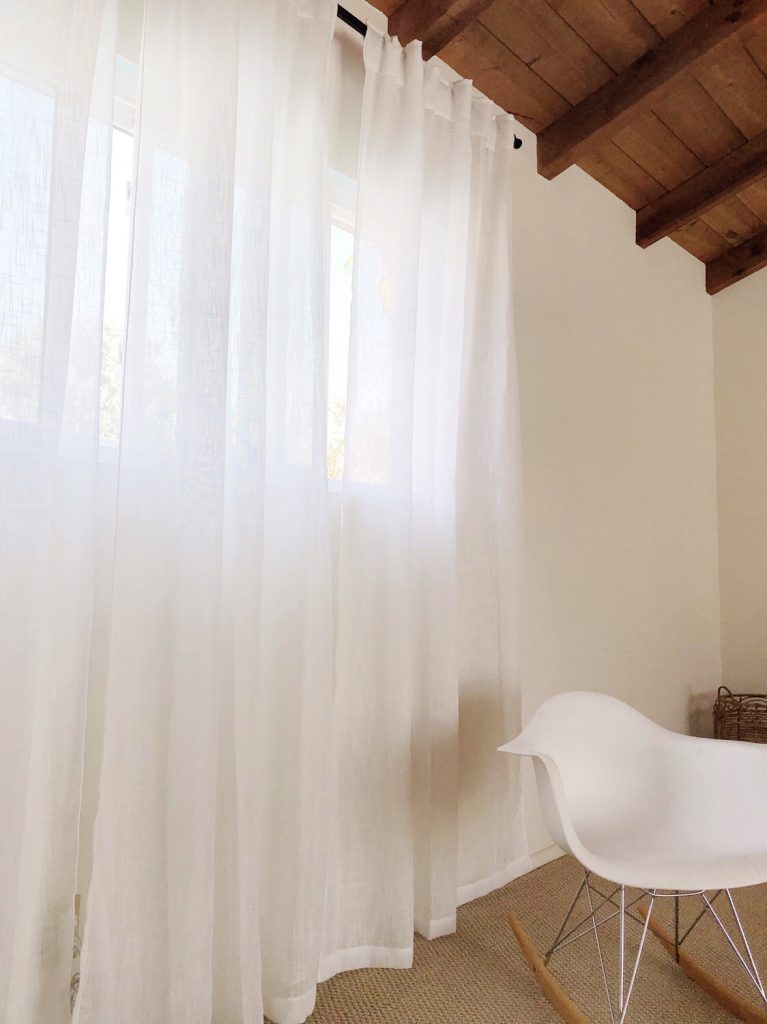 elevate a window with curtains 