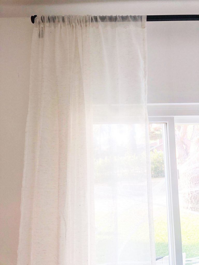 elevate a window with curtains 