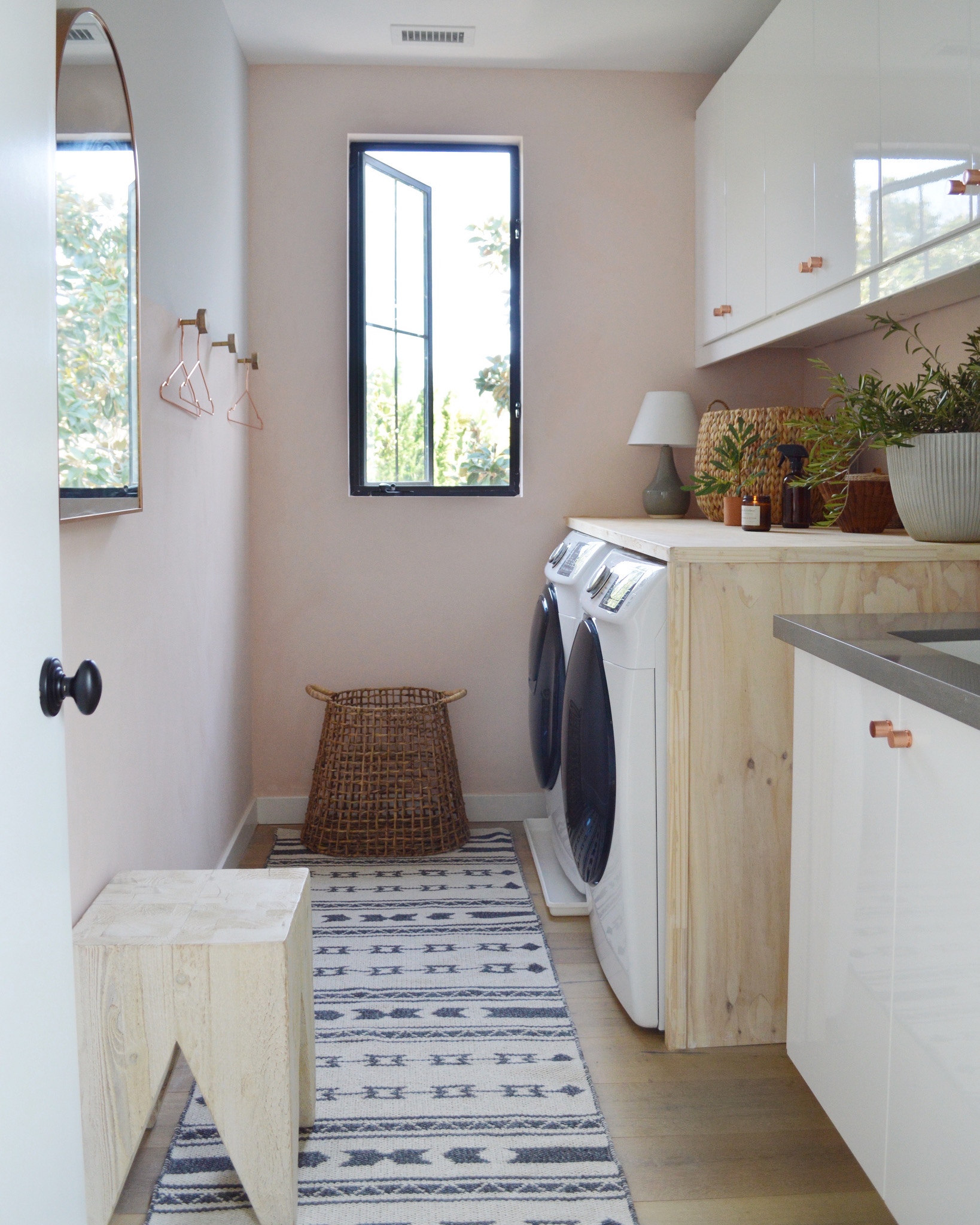 laundry room update - lime wash paint and DIY counter for folding to maximize the space