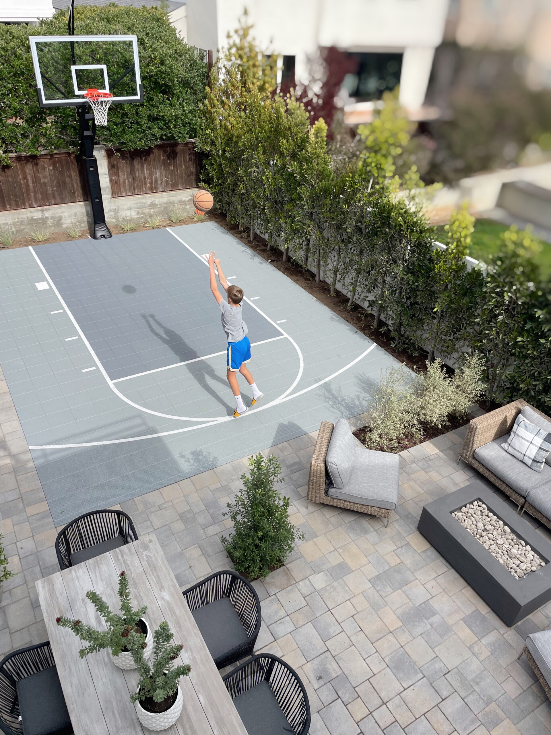backyard transformation with a basketball court!