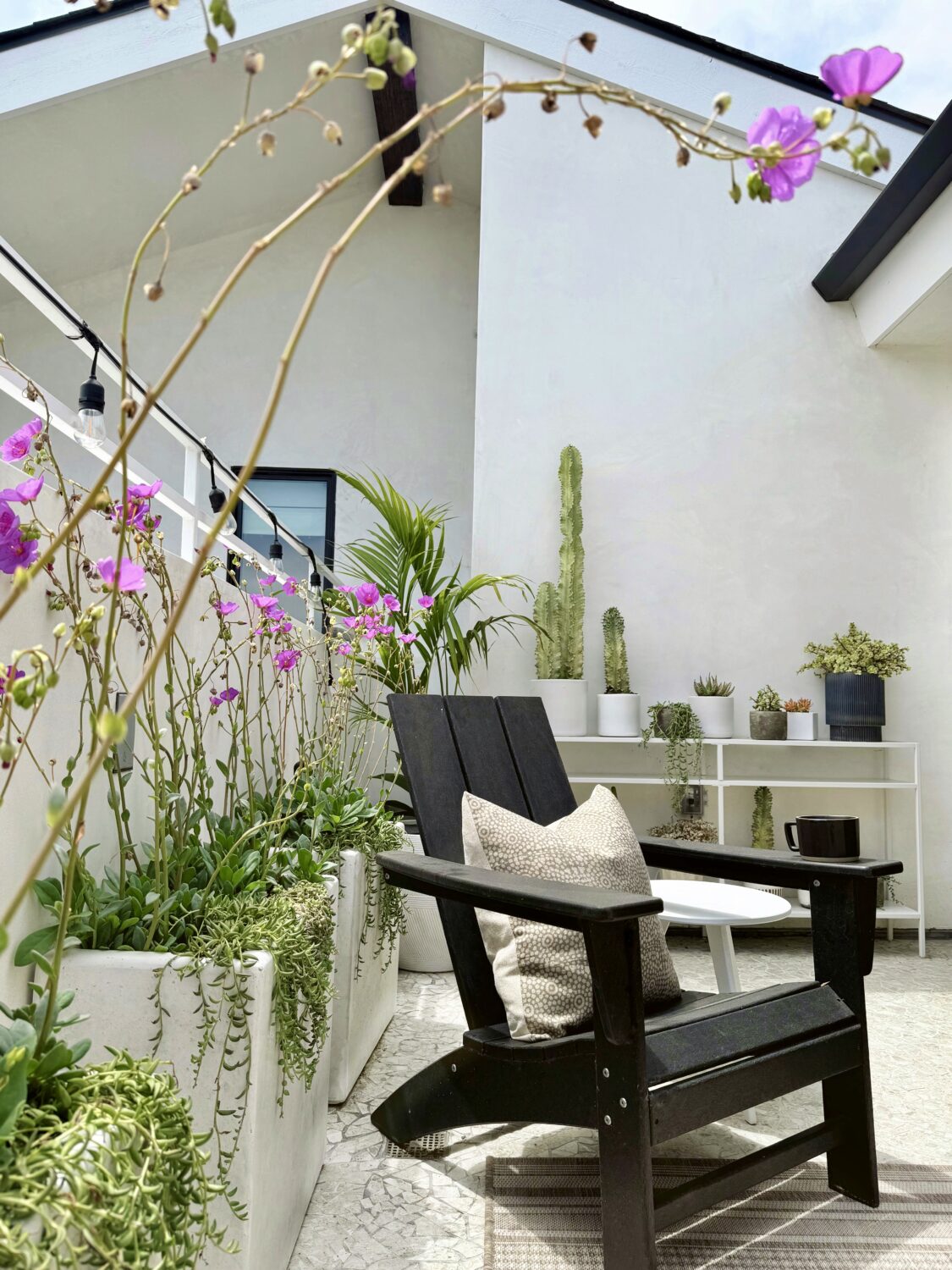 tips on how to refresh your outdoor space by adding greenery and textiles 